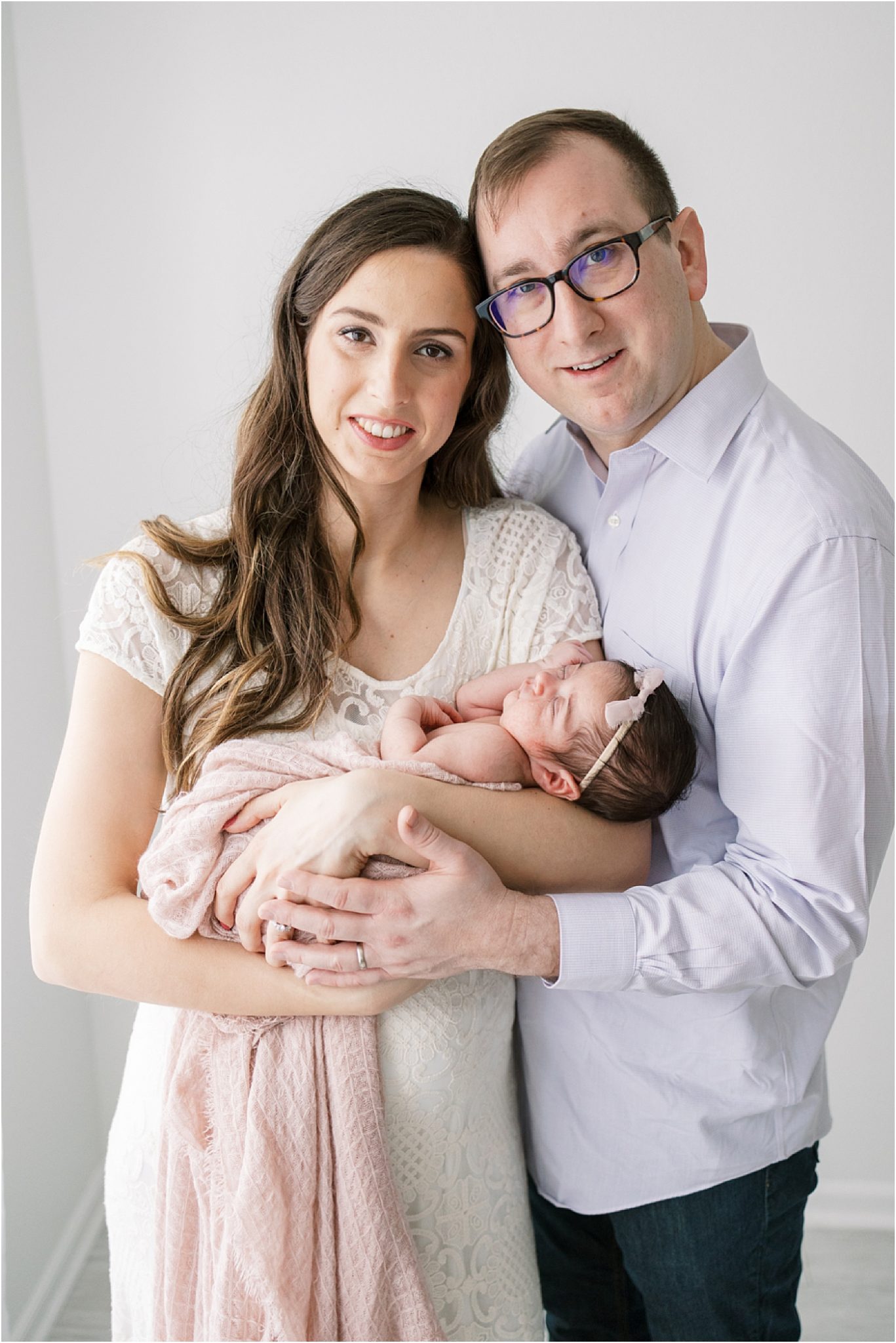Newborn family portrait in studio in Fishers Indiana. Photos by Lindsay Konopa Photography.