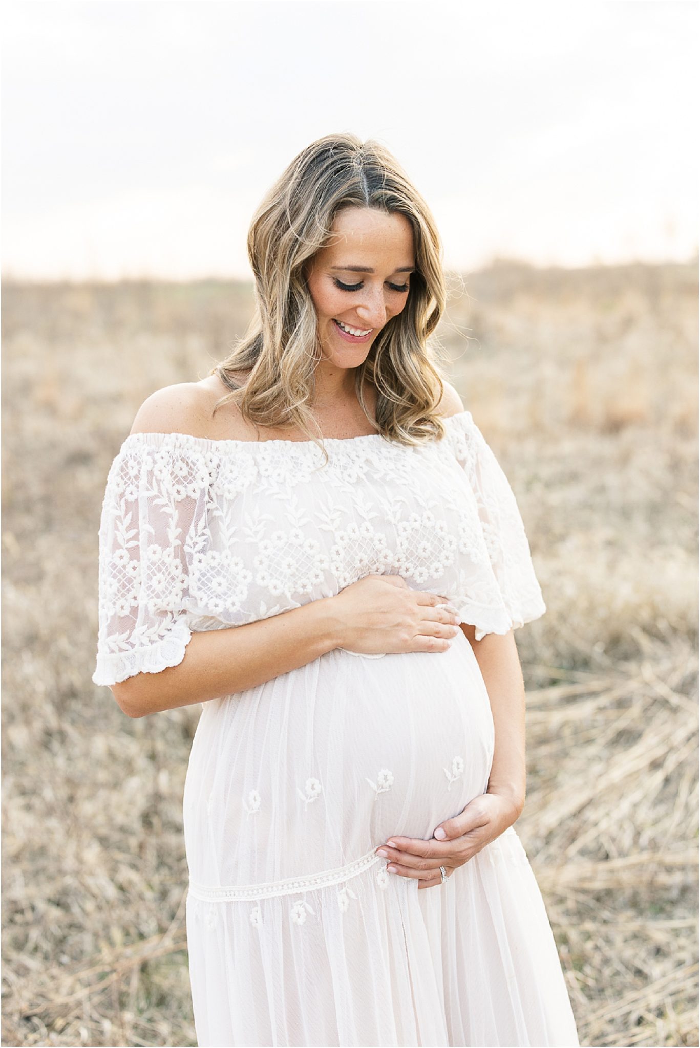 Pregnant mama wearing a beautiful lace dress. Photo by Broad Ripple IN Maternity Photographer, Lindsay Konopa Photography.