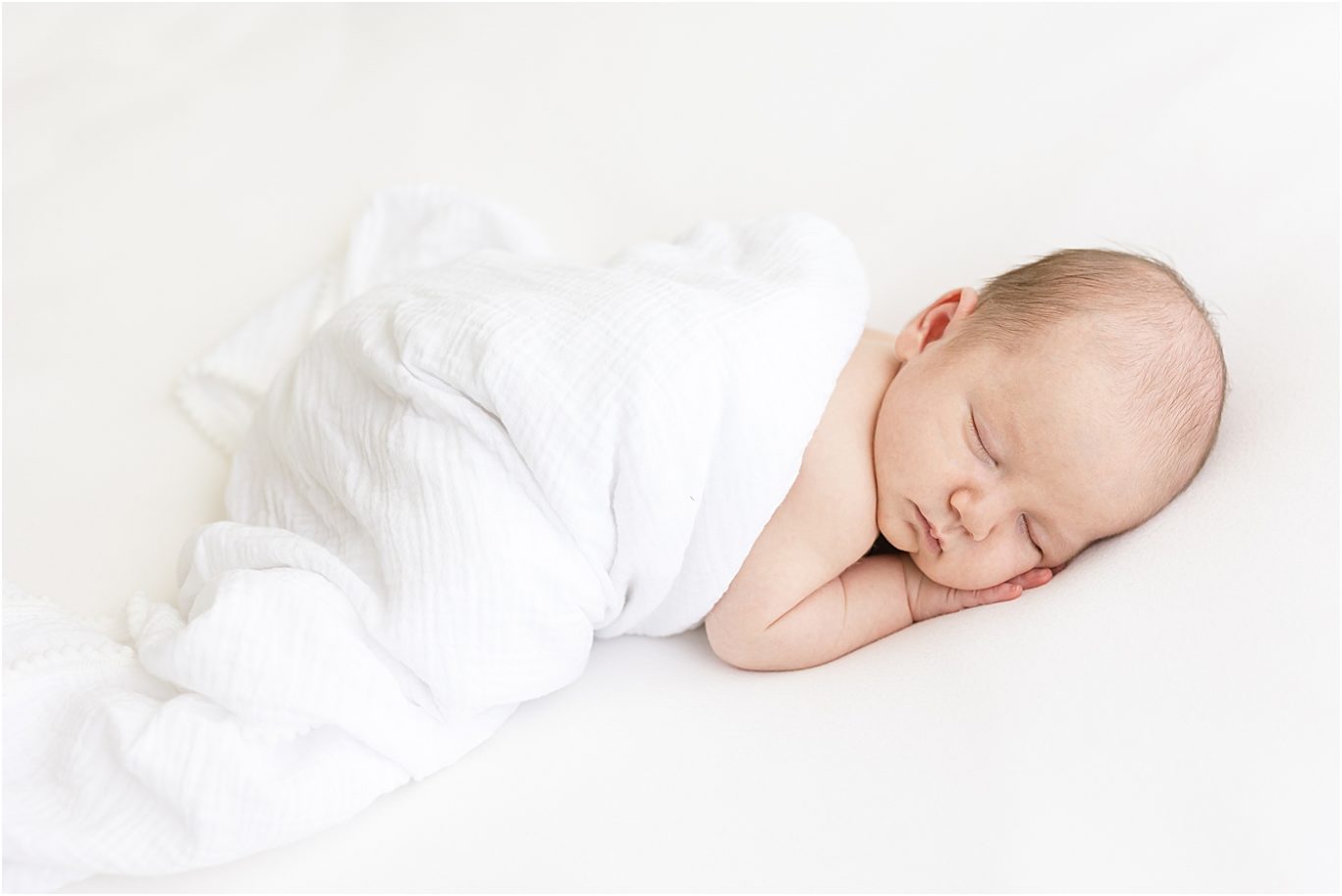 Baby boy sleeping on stomach for newborn session with Lindsay Konopa Photography in Fishers.