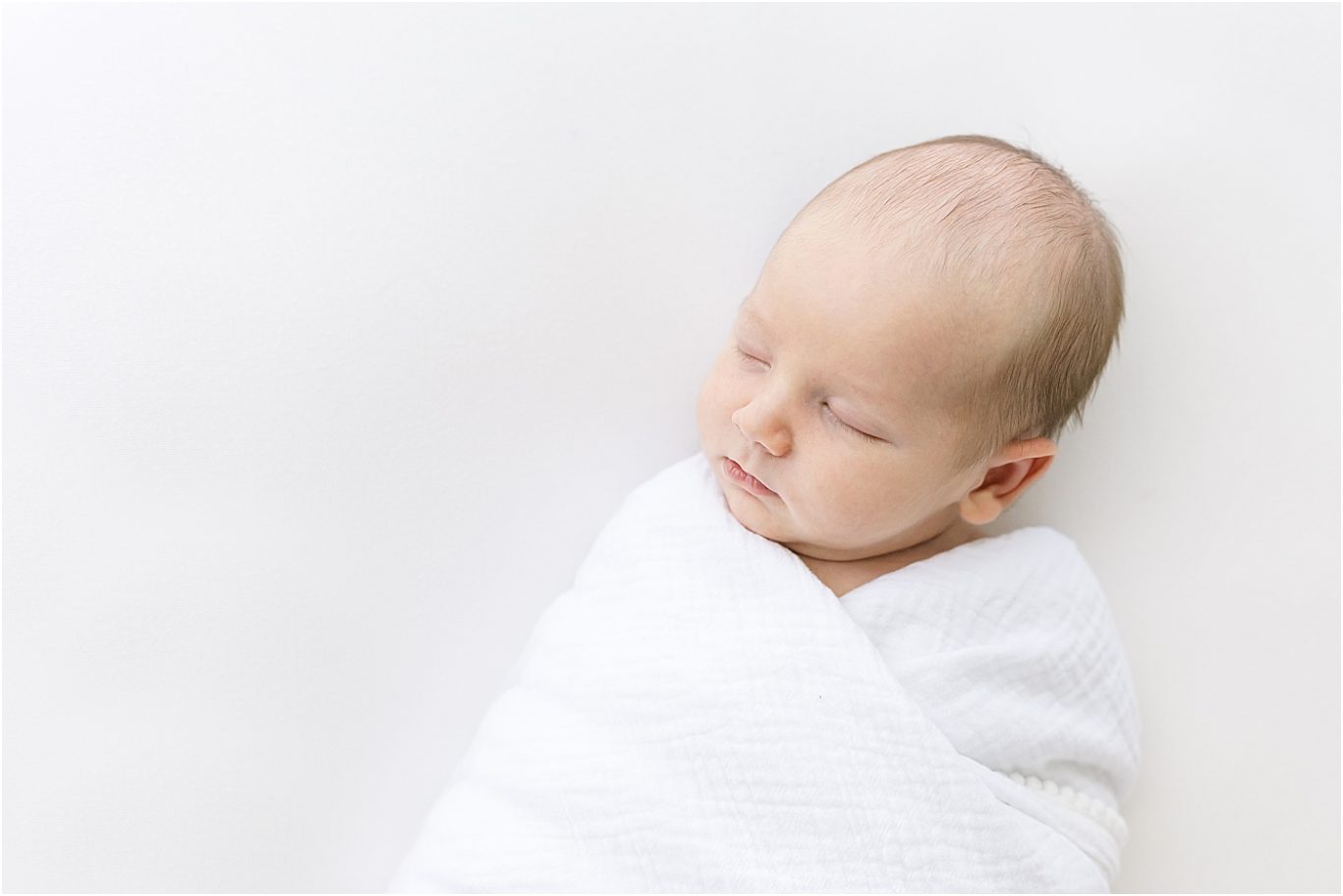 Baby boy sleeping for newborn session with Lindsay Konopa Photography in Fishers.