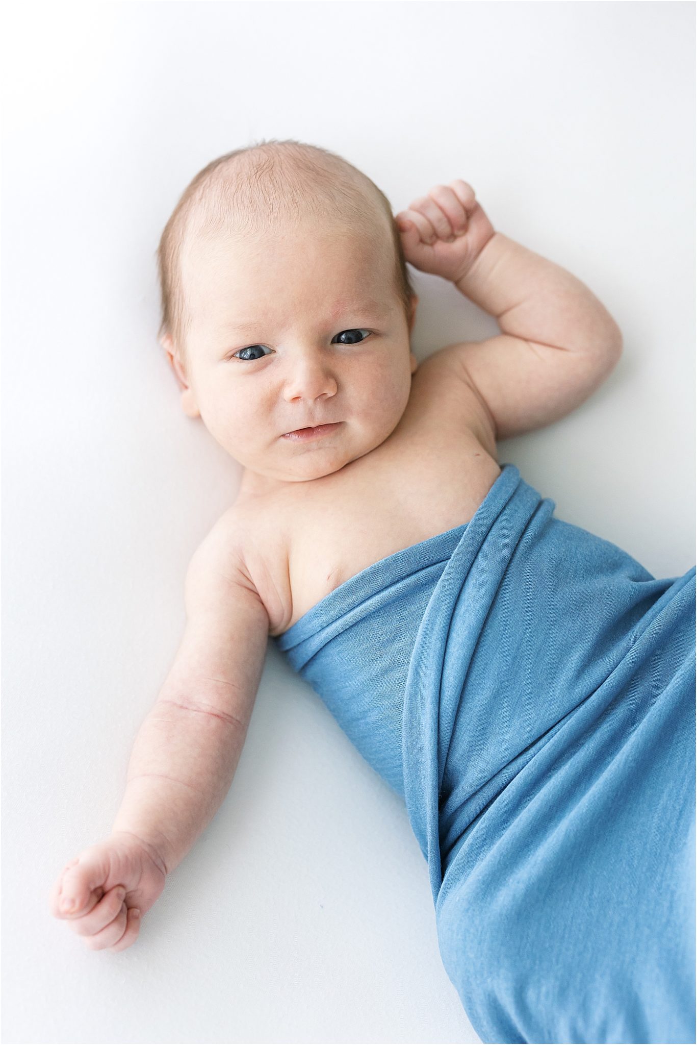 Studio newborn photography with baby-led posing in Fishers Indiana | Lindsay Konopa Photography
