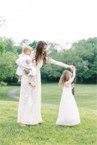 Mom dancing with her daughters. Photo by Lindsay Konopa Photography