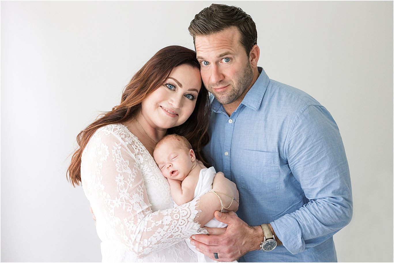 First family portrait of mom, dad and baby boy. Photo by Lindsay Konopa Photography