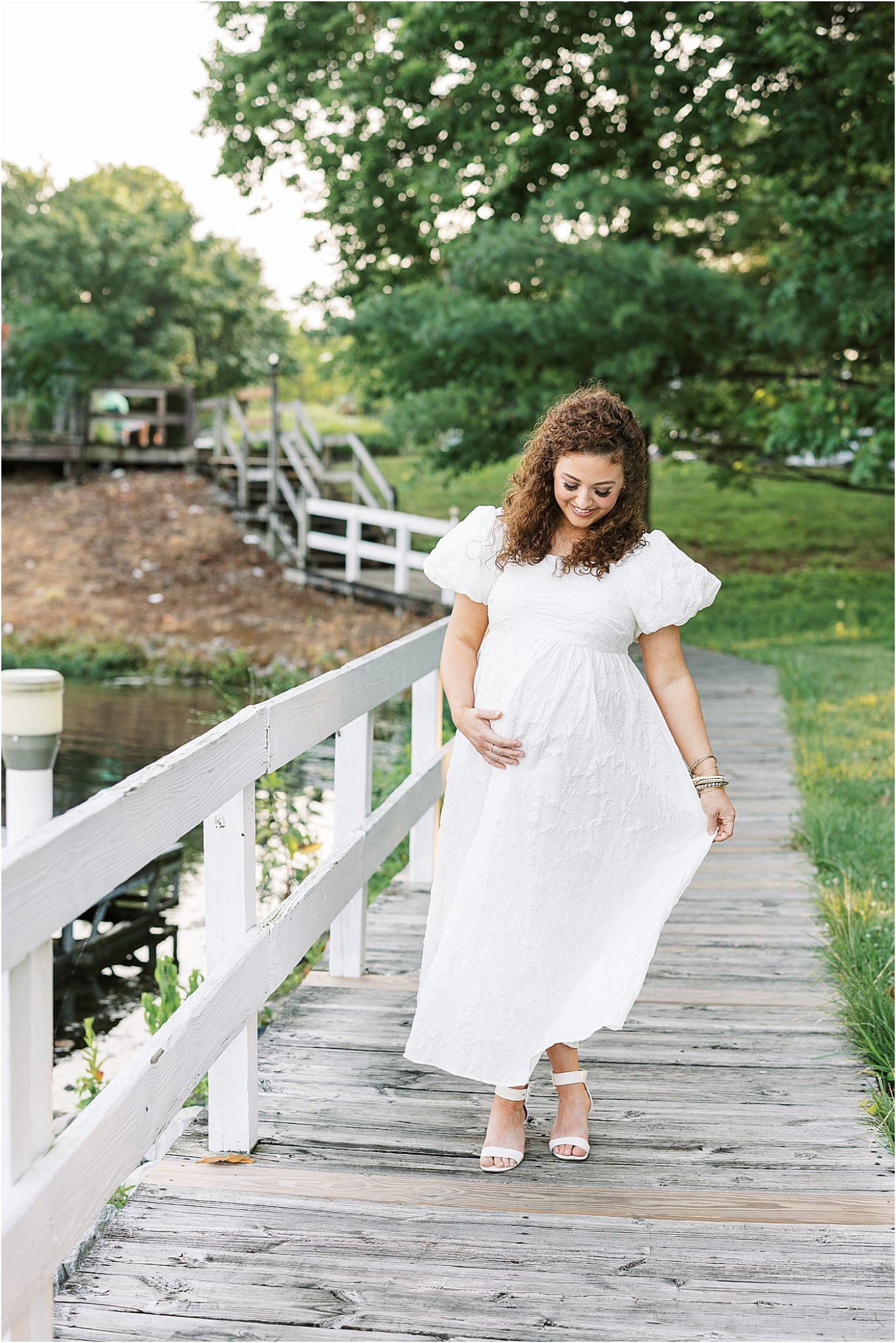 Pregnant mom in beautiful white dress for maternity photos with Lindsay Konopa Photography.