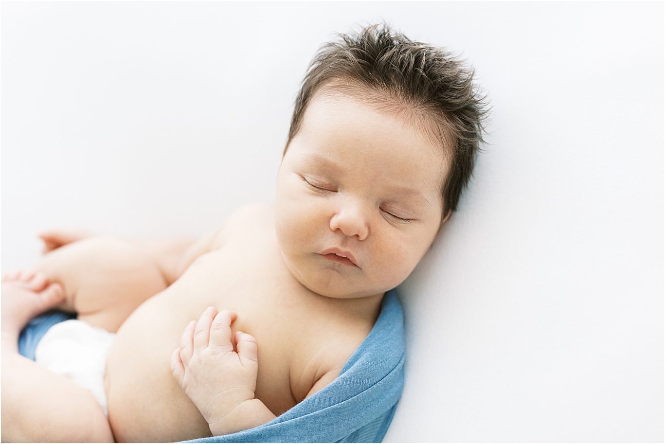 Baby boy sleeping during newborn photos with Indy Newborn Photographer, Lindsay Konopa Photography.