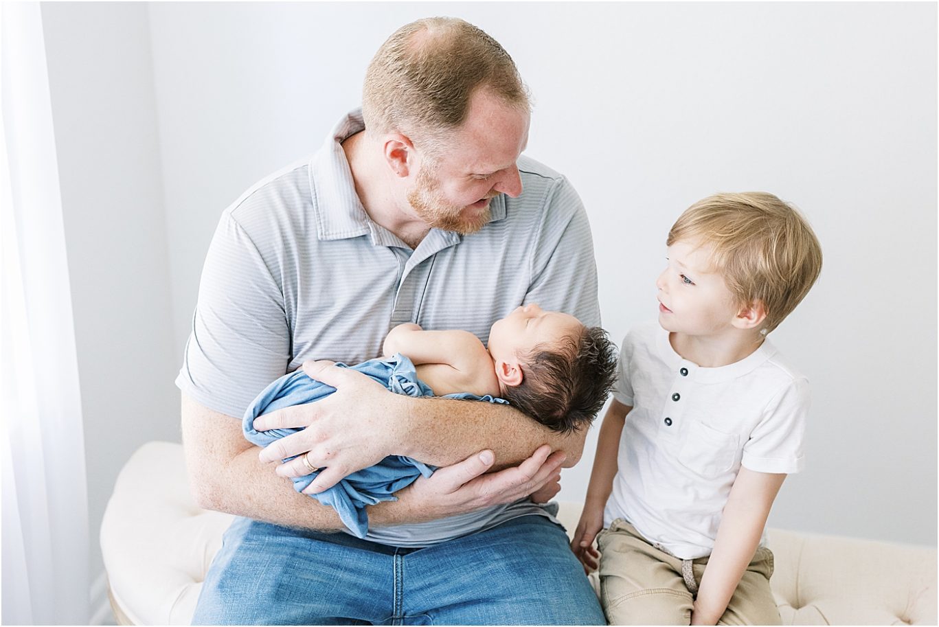 Dad with his two boys | Photo by Lindsay Konopa Photography