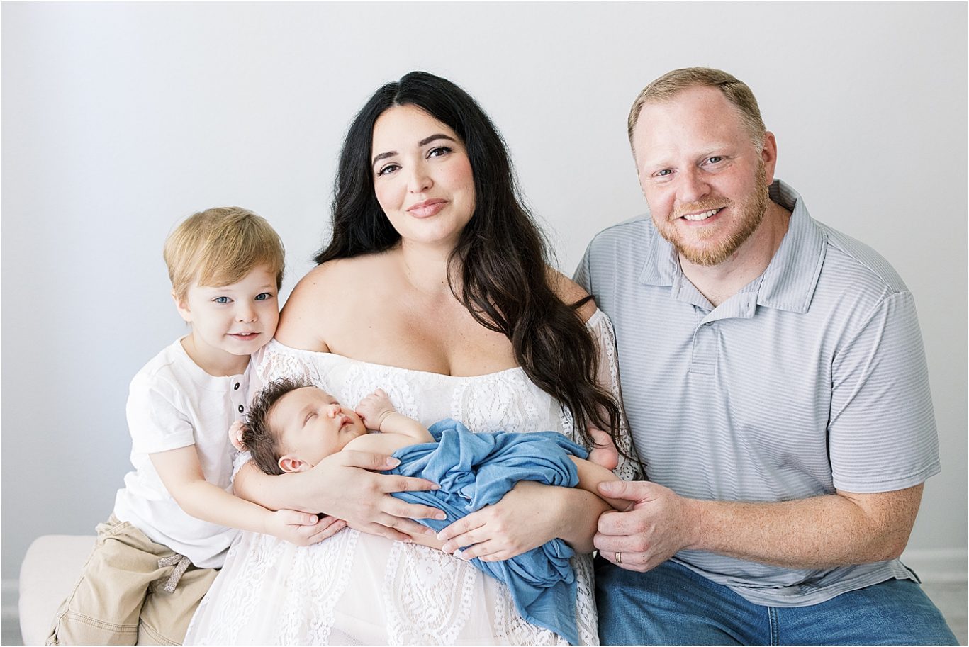 Family portrait in photography studio in Fishers | Photo by Lindsay Konopa Photography