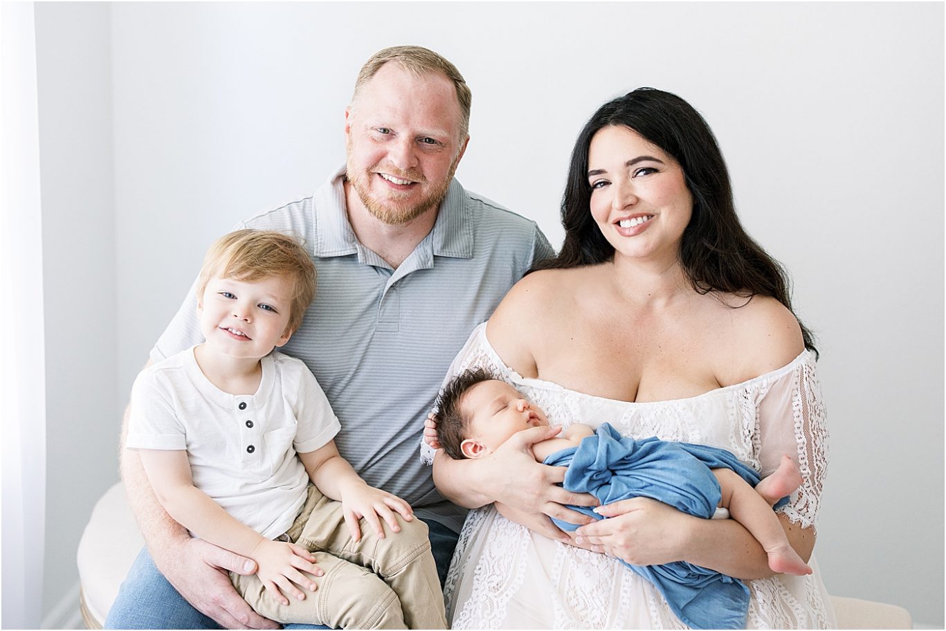 Family portrait in photography studio in Fishers | Photo by Lindsay Konopa Photography