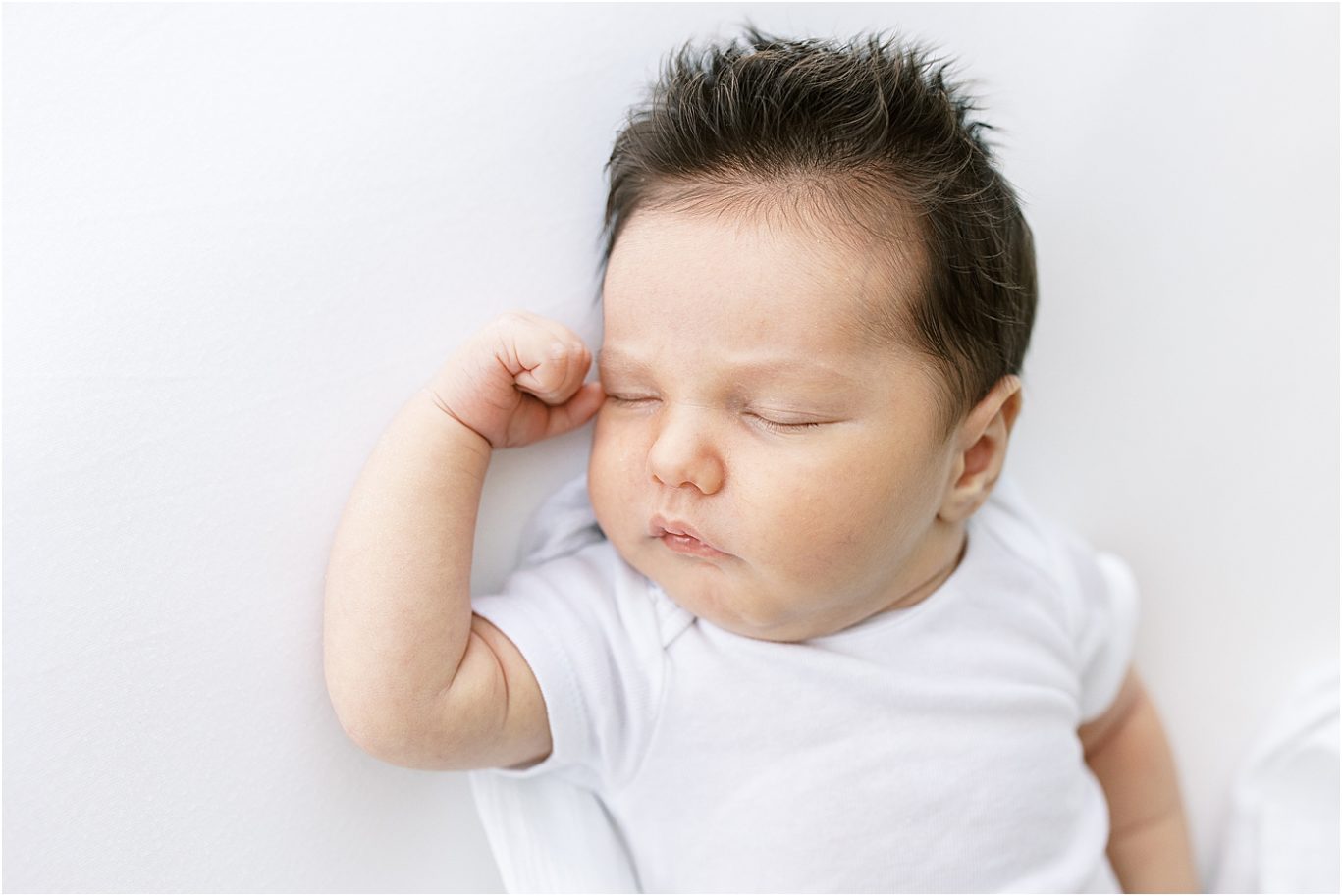 Baby boy sleeping for newborn photos with Lindsay Konopa Photography.