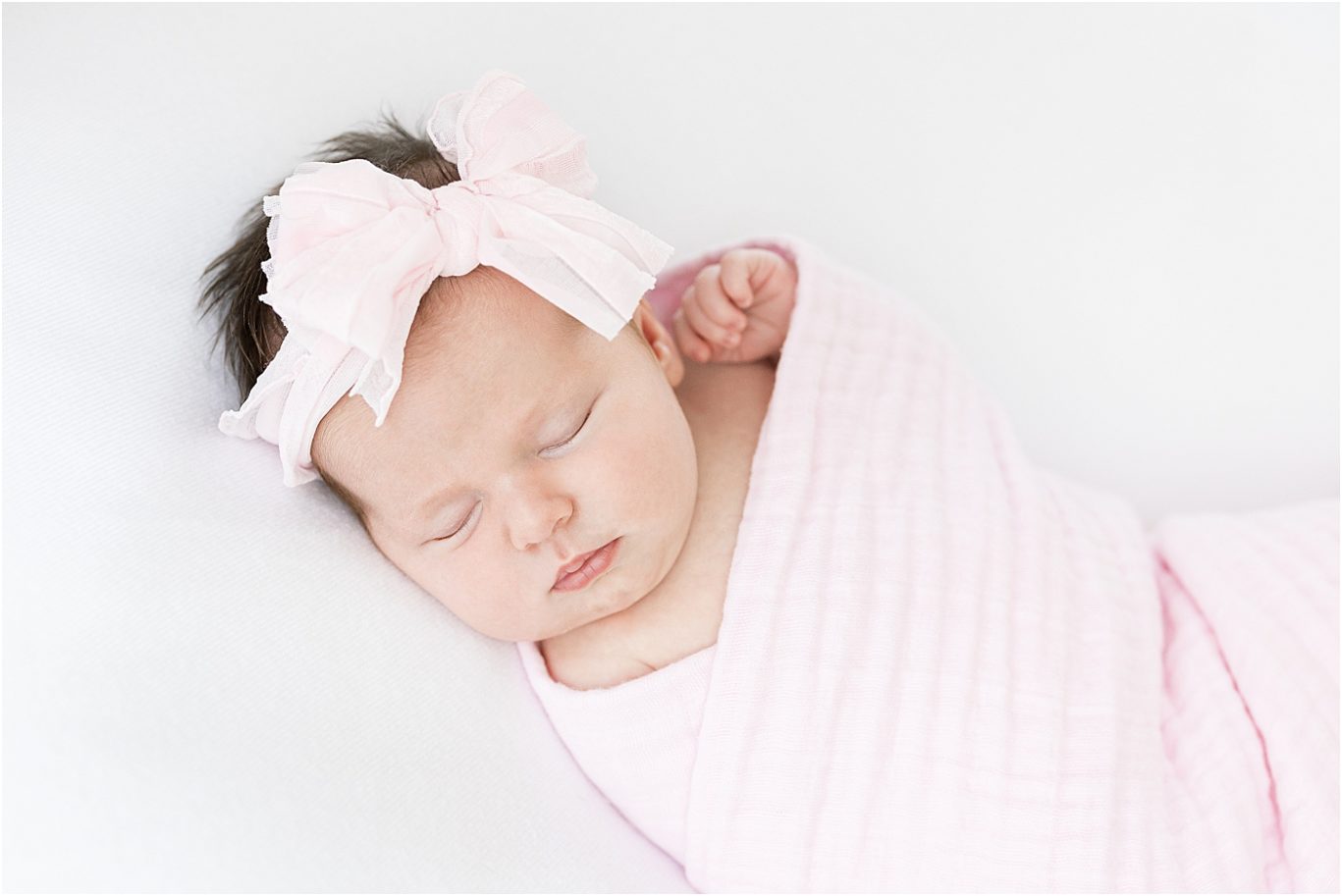 Baby girl swaddled in pink | Lindsay Konopa Photography