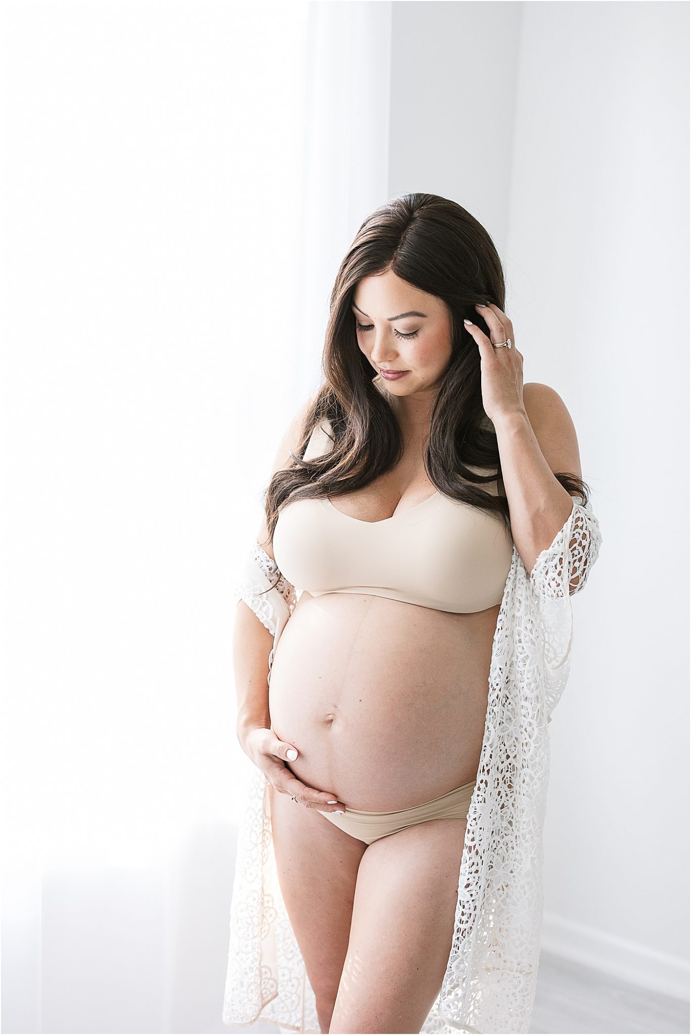Intimate maternity session in studio in Fishers Indiana. Photo by Lindsay Konopa Photography.