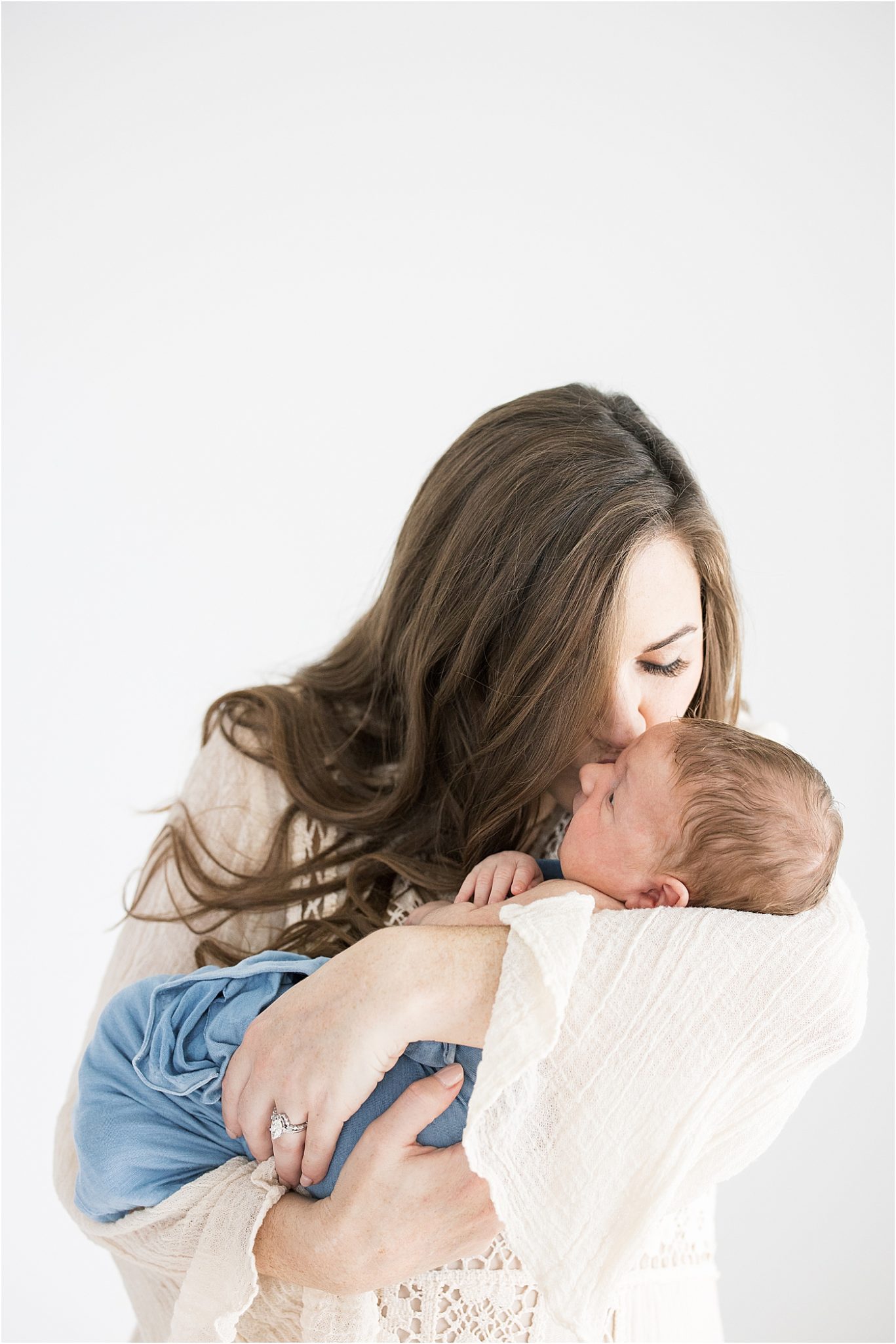 Mom giving son a kiss | Lindsay Konopa Photography