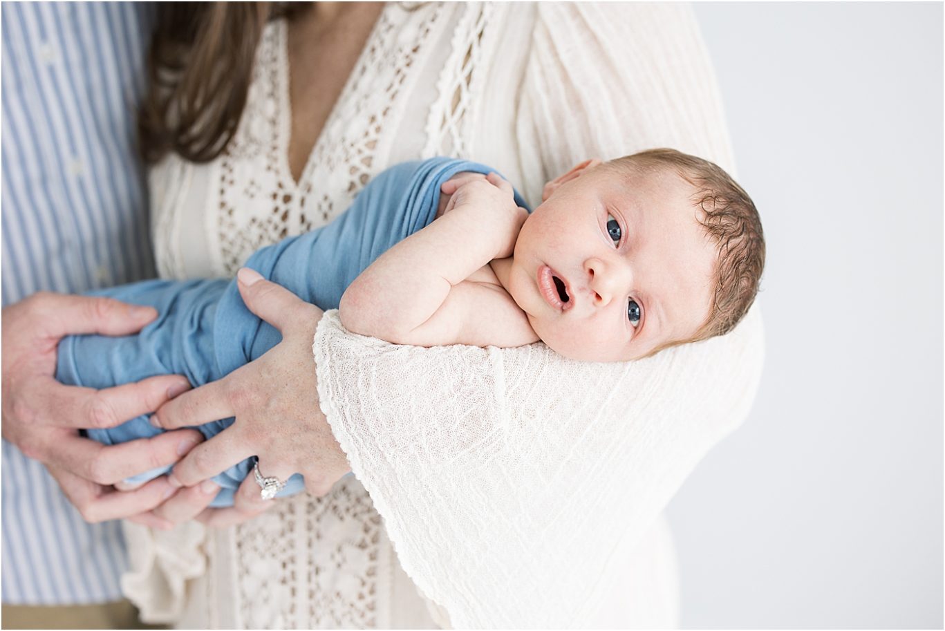 Baby boy awake for newborn photos in studio in Lindsay Konopa Photography.