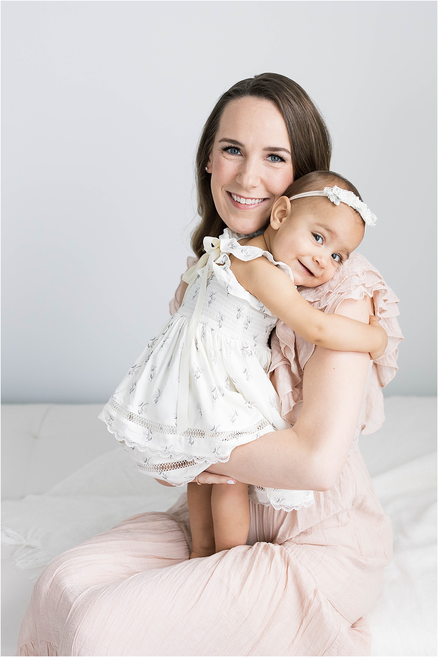 One year old hugging Mom during photoshoot with Lindsay Konopa Photography.