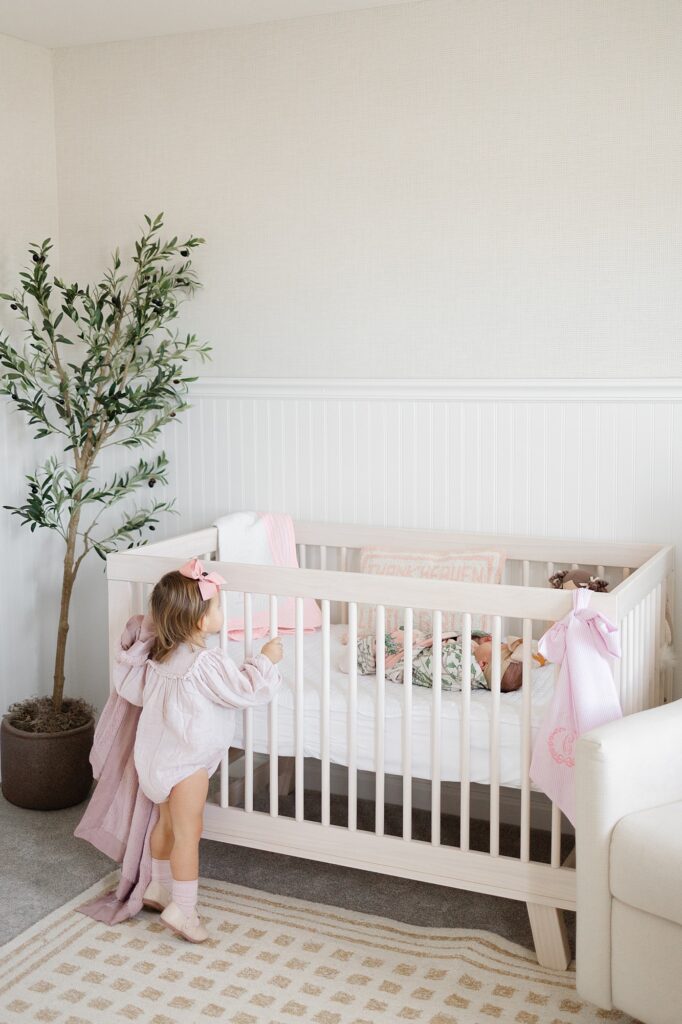 How to prepare older siblings for a newborn photo session, whether in studio or in your home. Helpful advice from a Carmel, Indiana newborn photographer.